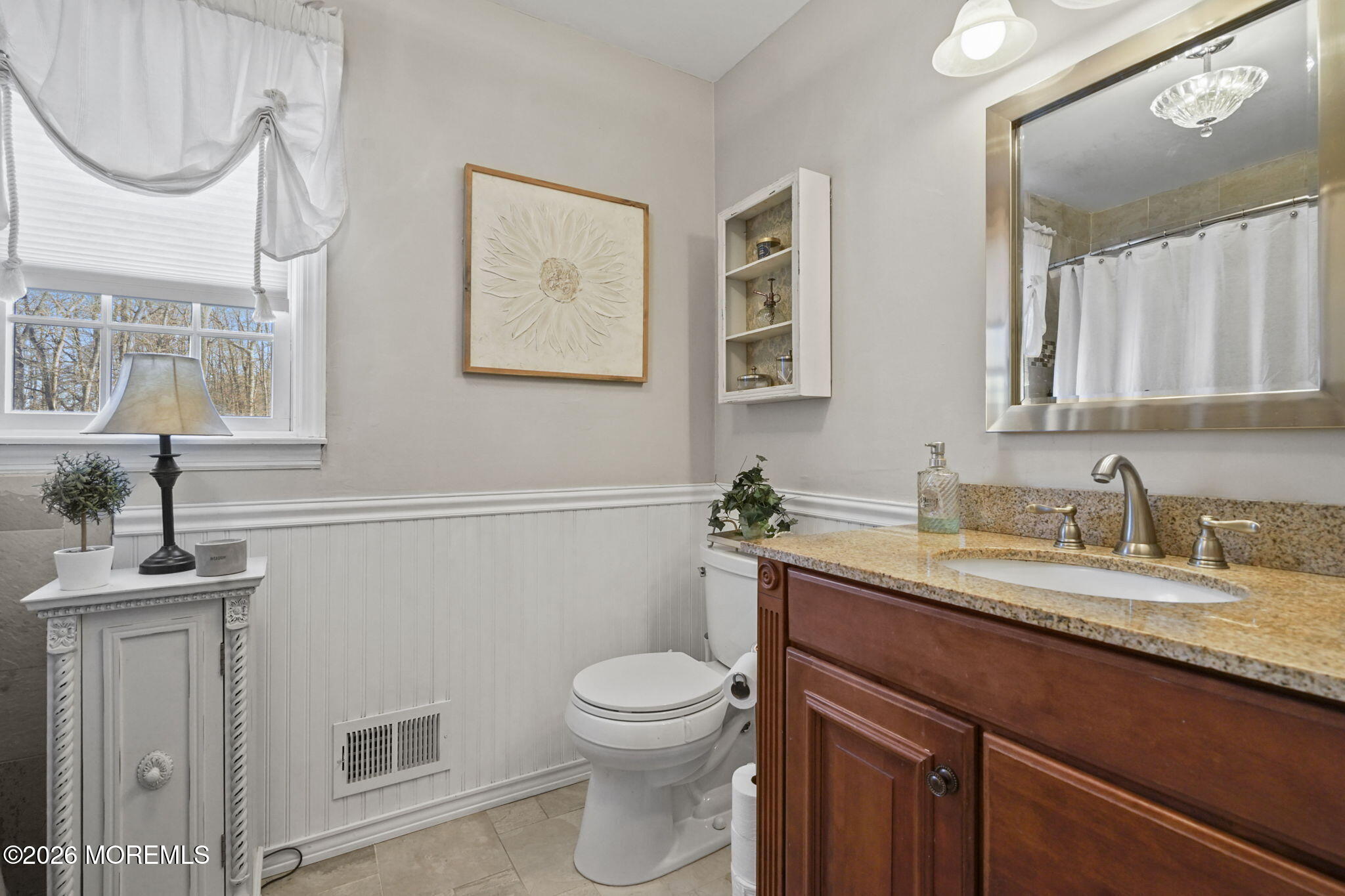 12 Rimwood Lane Howell, NJ 07731 - Photo 17 of 34 a bathroom with a granite countertop toilet sink and mirror