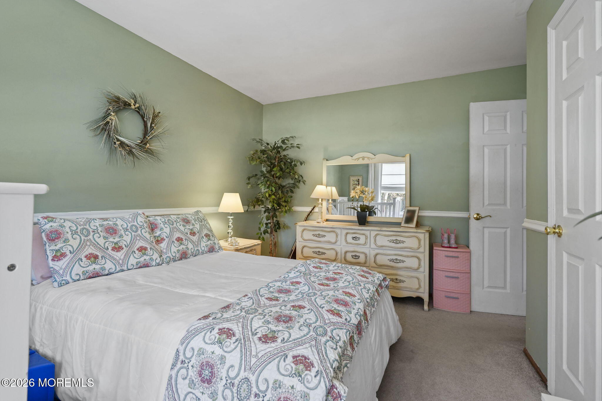 12 Rimwood Lane Howell, NJ 07731 - Photo 21 of 34 a bedroom with a large bed and a dresser