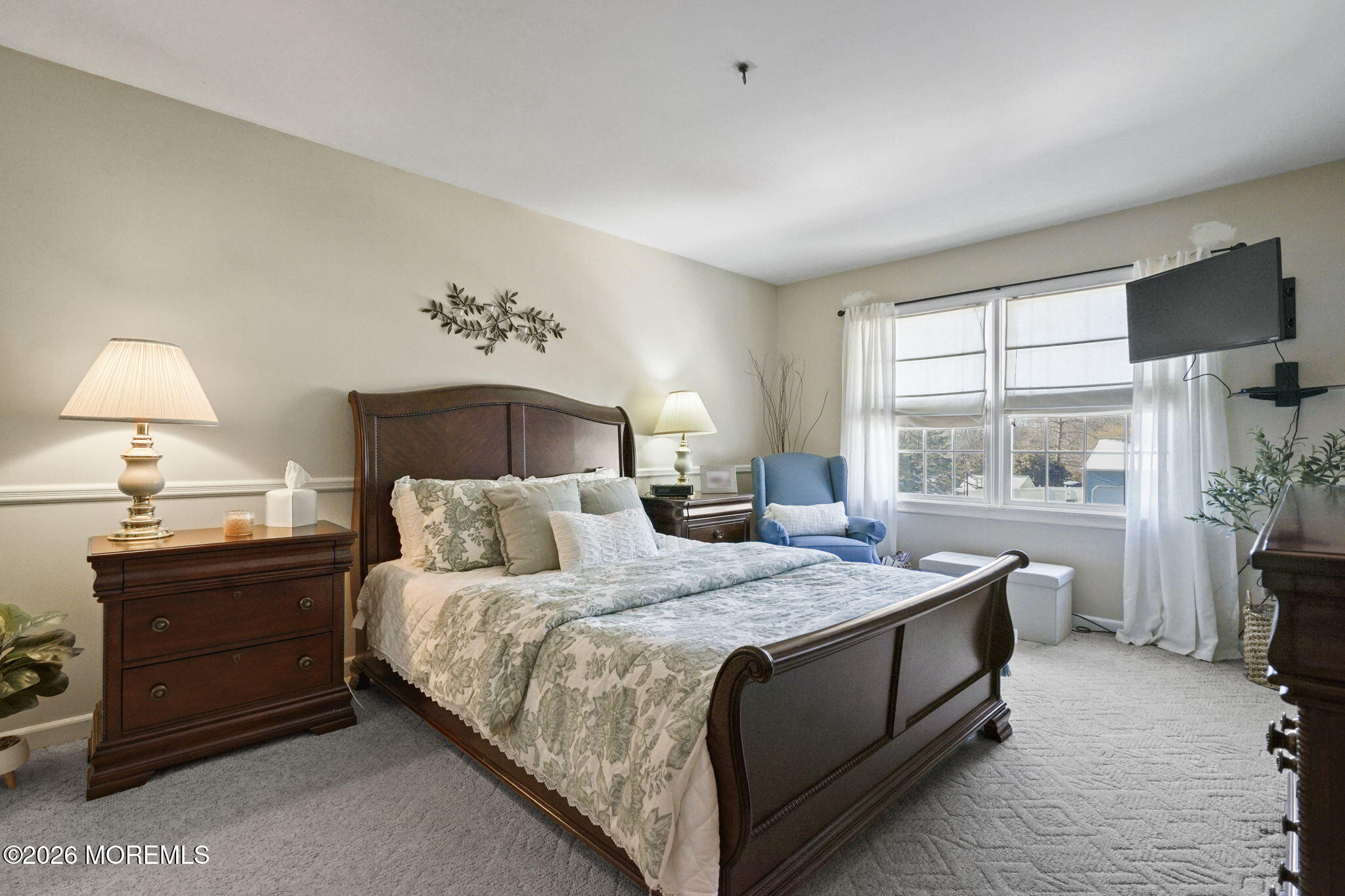 12 Rimwood Lane Howell, NJ 07731 - Photo 24 of 34 a bedroom with a large bed and a window