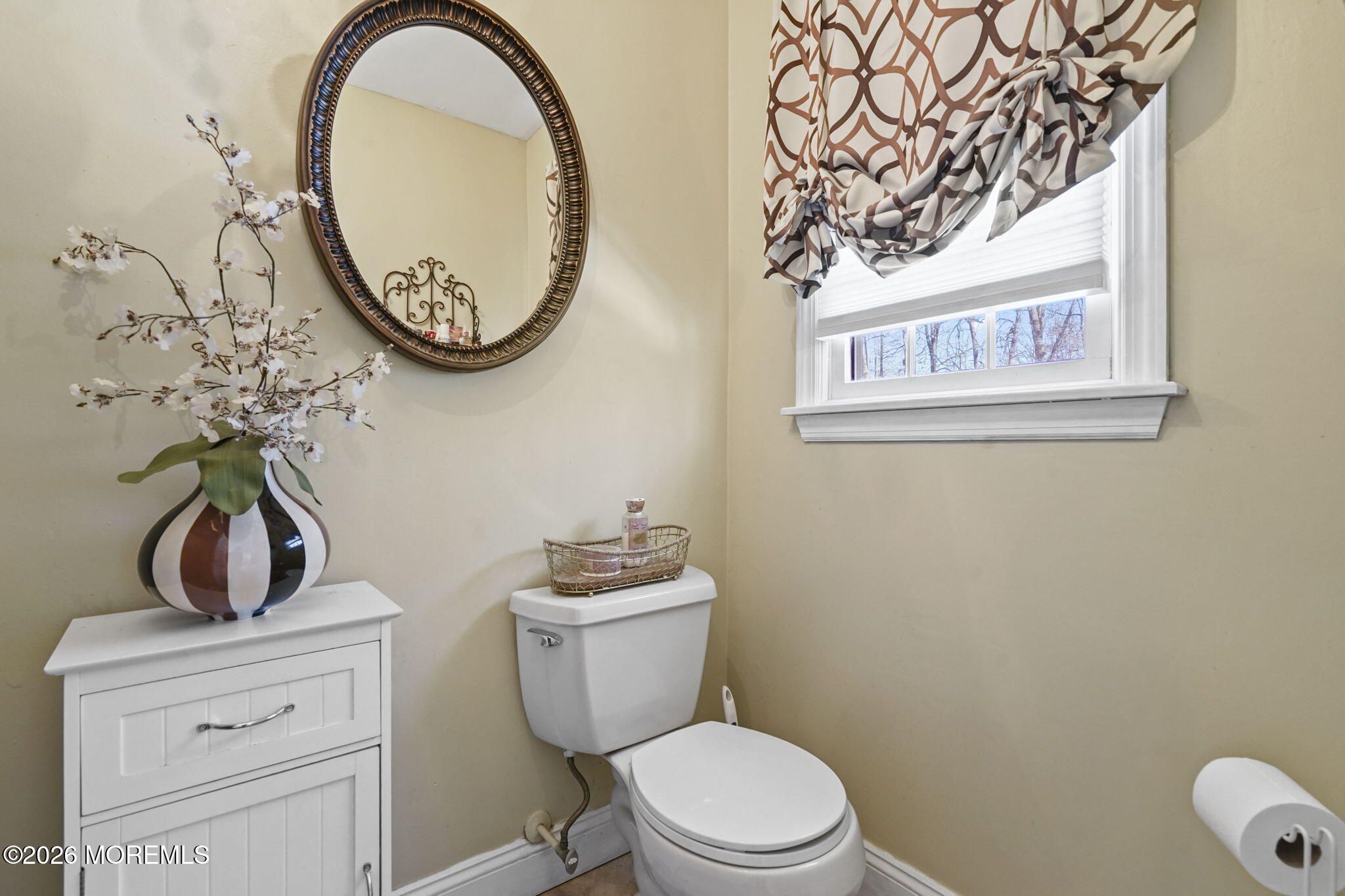 12 Rimwood Lane Howell, NJ 07731 - Photo 26 of 34 a bathroom with a toilet a sink and a mirror