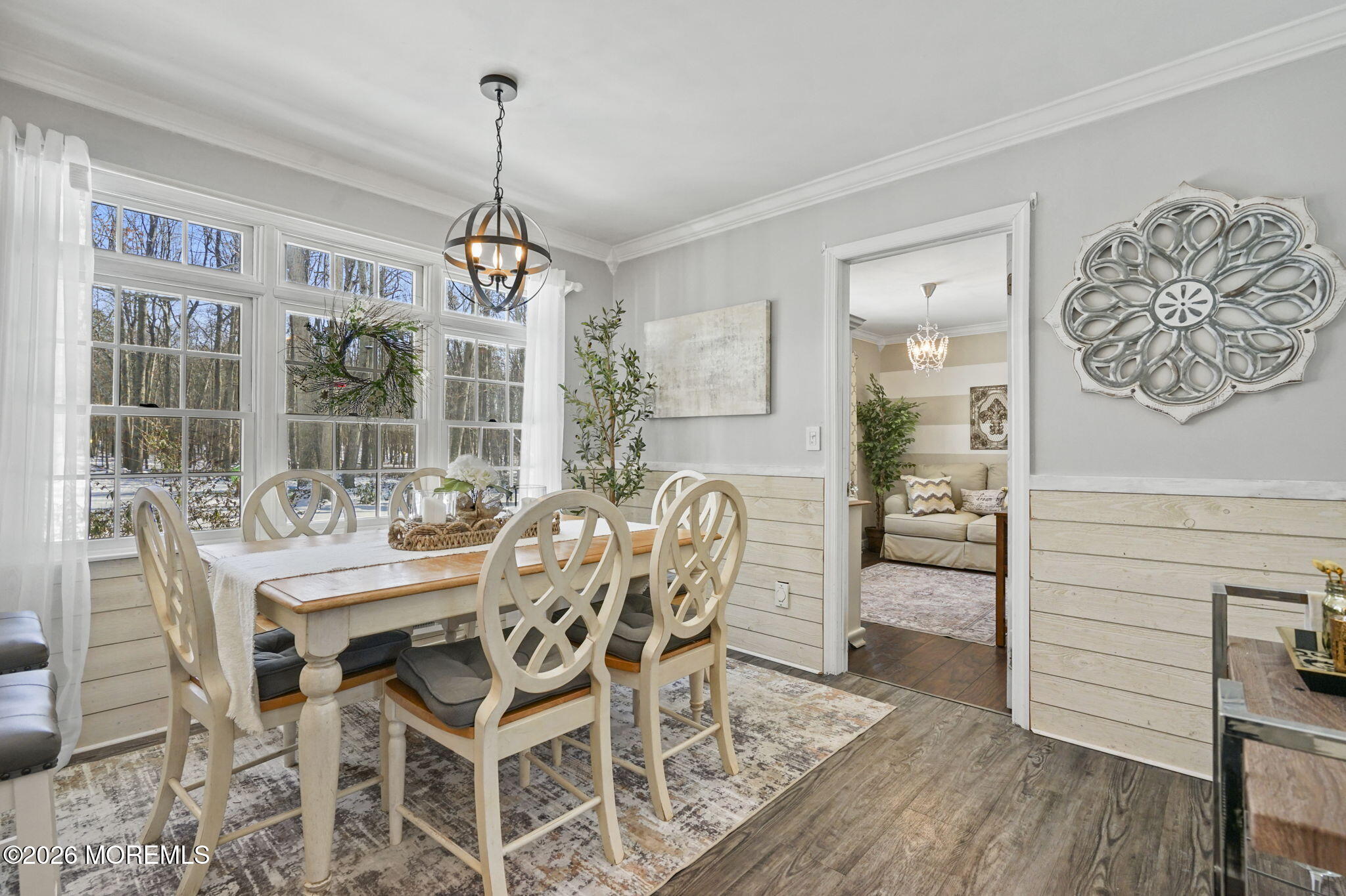 12 Rimwood Lane Howell, NJ 07731 - Photo 6 of 34 a dining room with furniture a chandelier and wooden floor