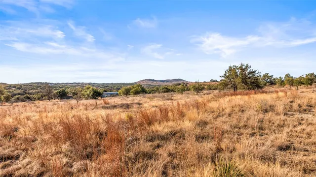 a view of lake with mountain