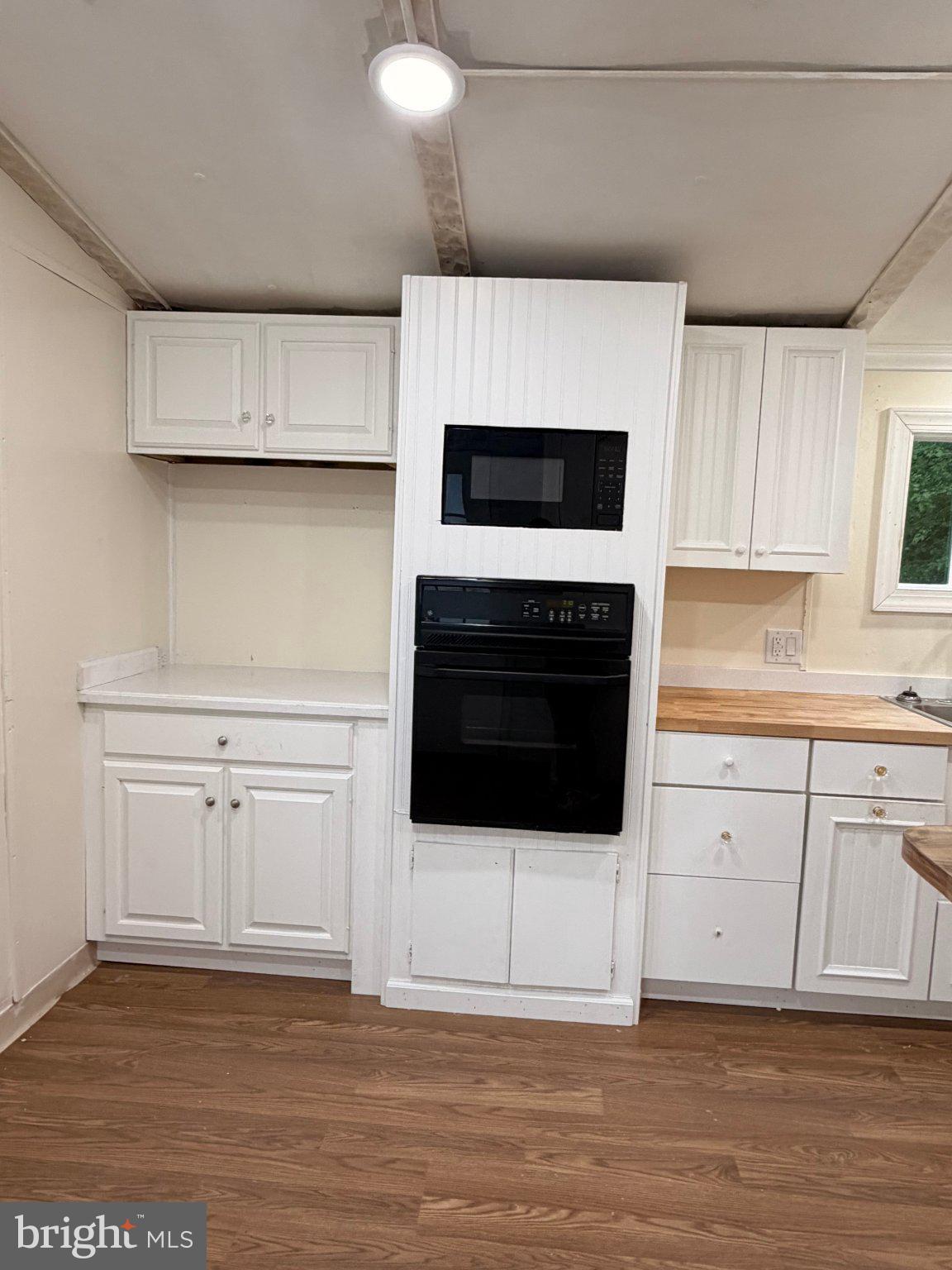 24 Carpenter Street, Unit 24 Dover, DE 19901 - Photo 20 of 27 Modern kitchen with sleek appliances.