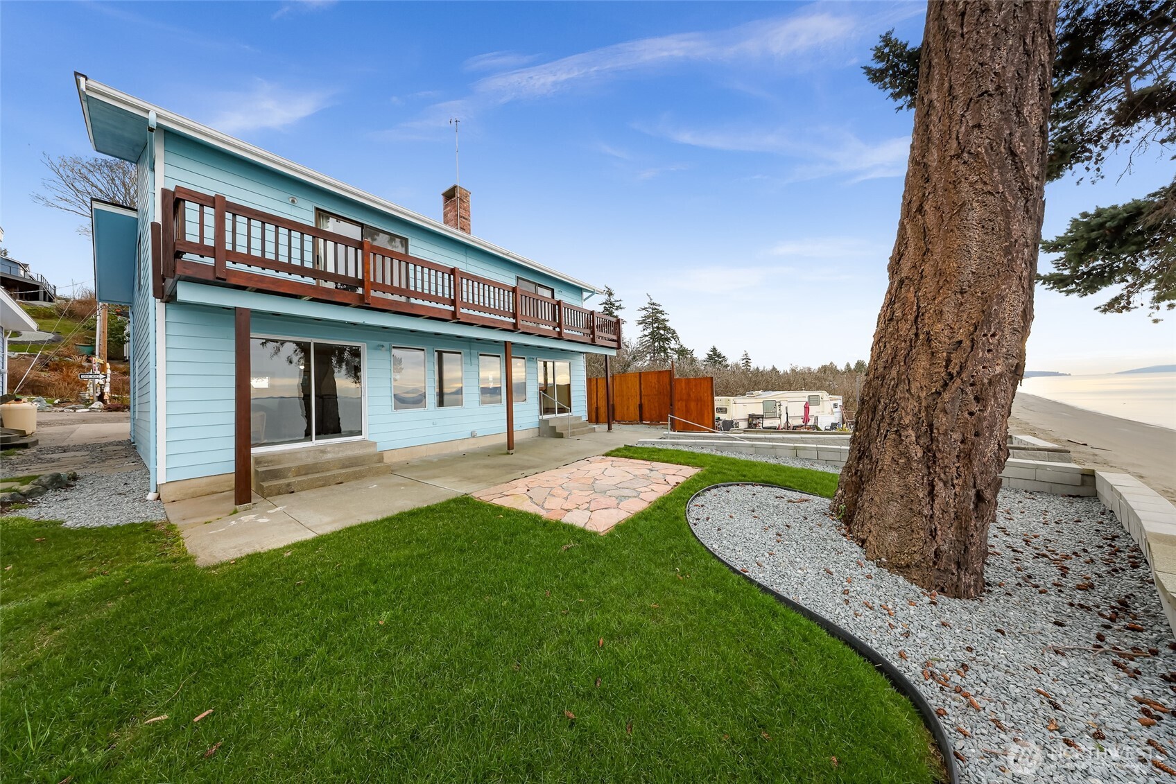 4877 Maple Lane Ferndale, WA 98248 - Photo 27 of 35 a view of a house with backyard and a tree