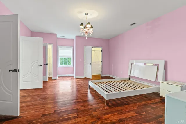 a front view of a house with a yard table and chairs