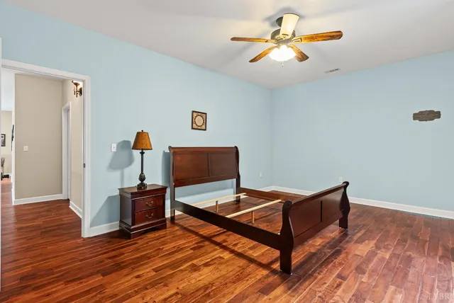 a view of a house with a yard and garage