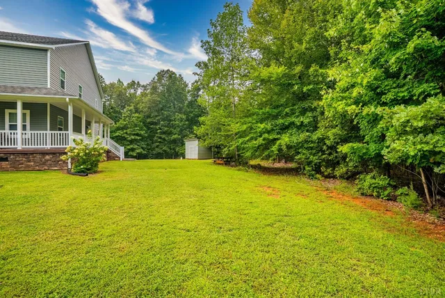 a view of a garden with a fountain