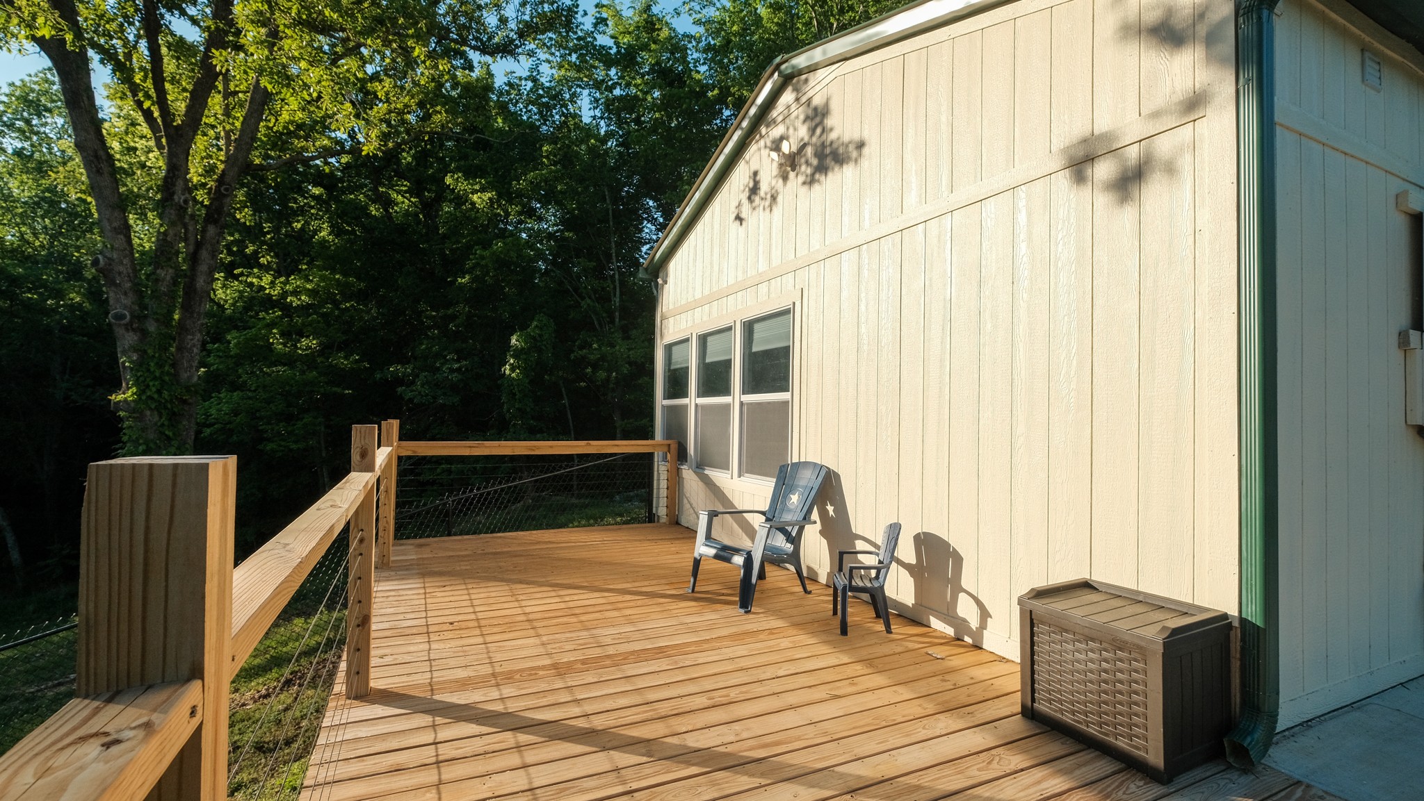 601 Pumpkin Ridge Road Dover, TN 37058 - Photo 16 of 50 a balcony with table and chairs