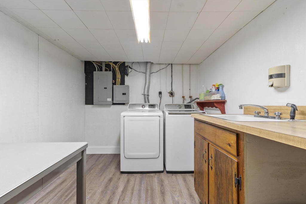 167 Gates Pond Road Berlin, MA 01503 - Photo 29 of 32 a utility room with sink dryer and washer
