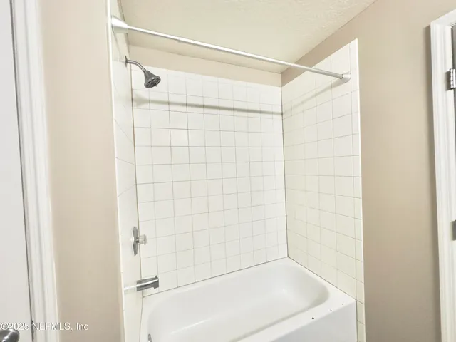 a bathroom with a bathtub