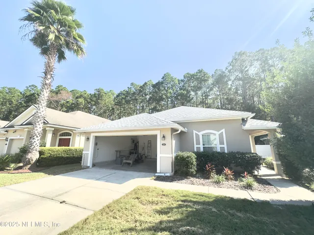 a view of swimming pool with a yard