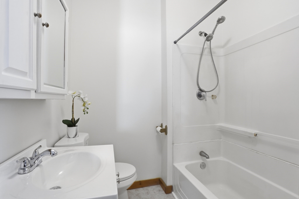 12 Whitcomb Street Webster, MA 01570 - Photo 14 of 40 a bathroom with a sink a toilet and shower