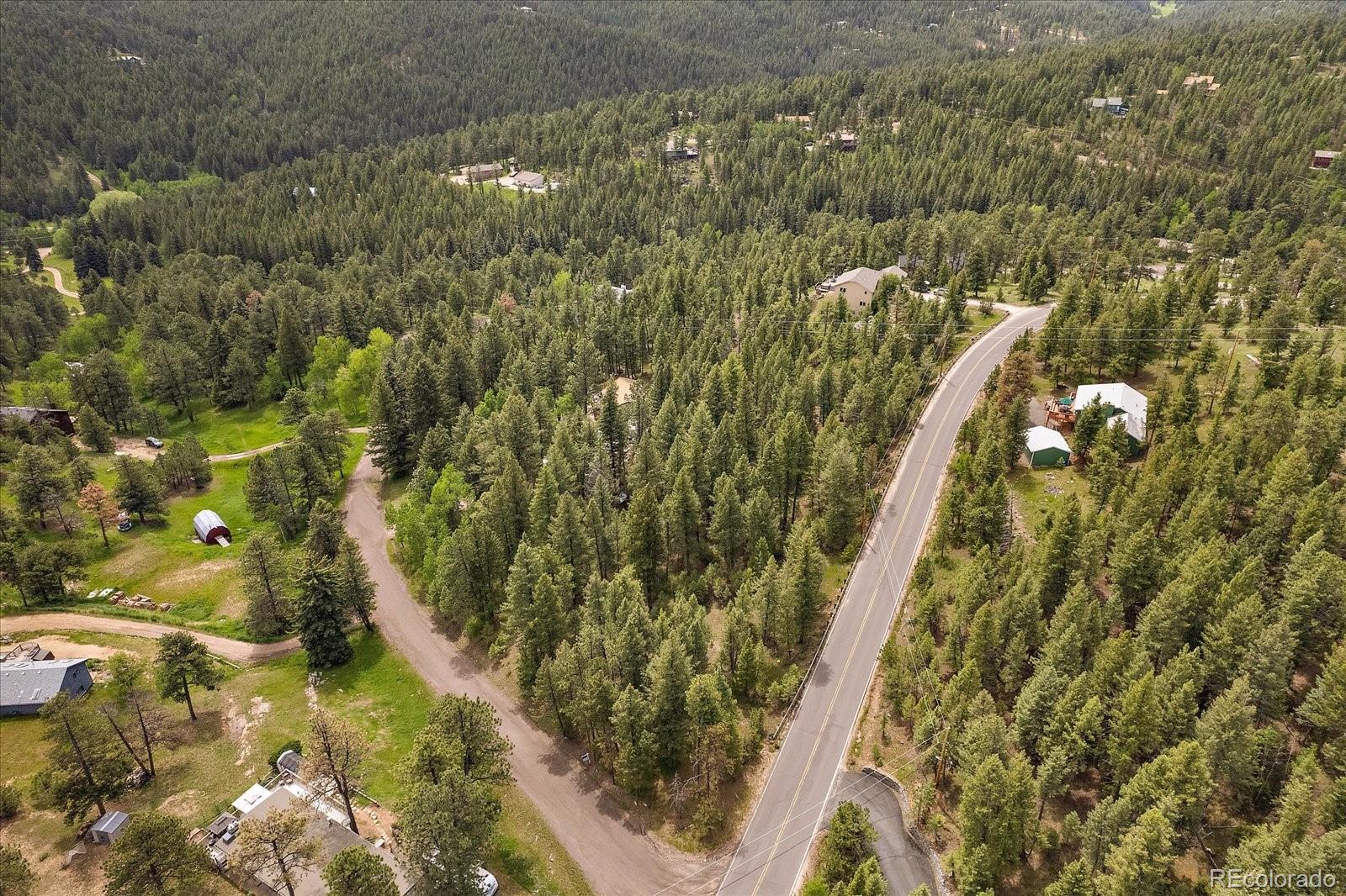 30540 Cobb Road Evergreen, CO 80439 - Photo 7 of 12 a view of a yard