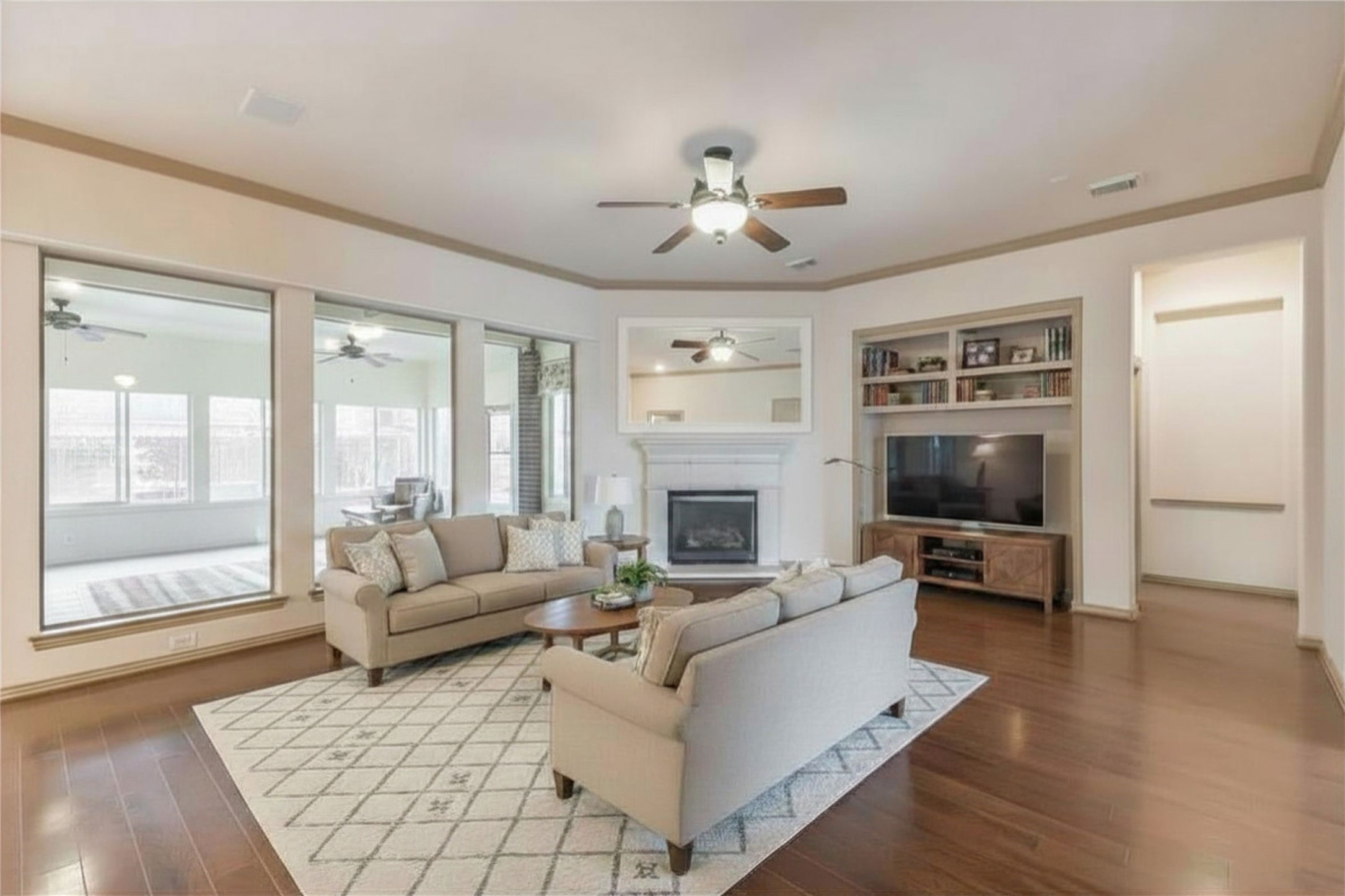 18743 Duke Lake Drive Spring, TX 77388 - Photo 17 of 42 a living room with furniture and a fireplace