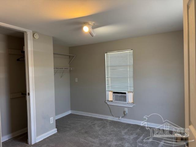 6114 East Fence Road Pensacola, FL 32526 - Photo 5 of 8 a view of an empty room with wooden floor and a window