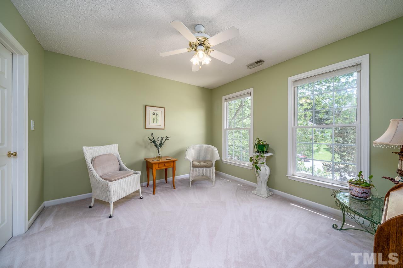 2308 Bolingbrook Lane Raleigh, NC 27613 - Photo 24 of 30 a living room with furniture and a window