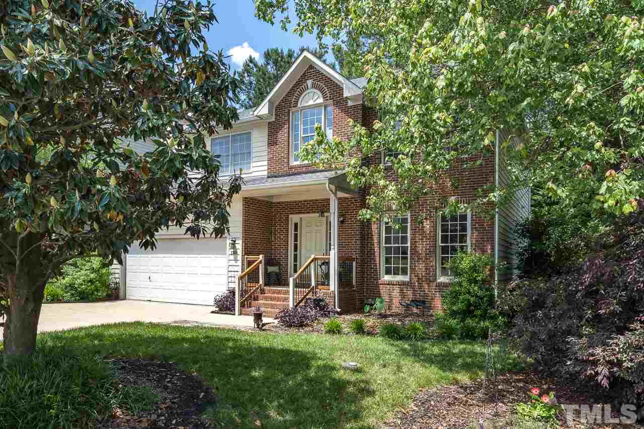 2308 Bolingbrook Lane Raleigh, NC 27613 - Photo 27 of 30 a view of a house with a yard and large trees