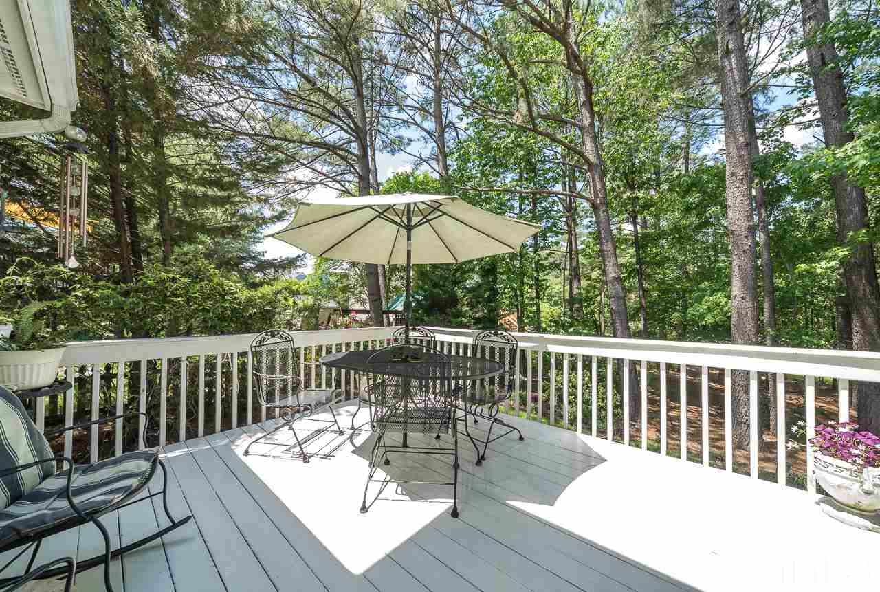 2308 Bolingbrook Lane Raleigh, NC 27613 - Photo 29 of 30 a view of a wooden deck with furniture