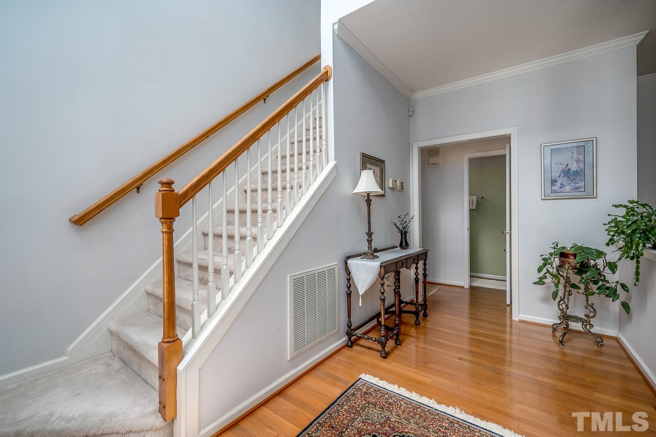 2308 Bolingbrook Lane Raleigh, NC 27613 - Photo 4 of 30 a view of entryway and hall with wooden floor