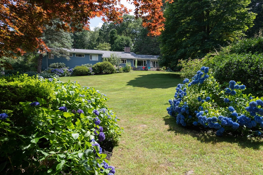 110 Robin Road Weston, MA 02493 - Photo 32 of 40 a view of house with garden space