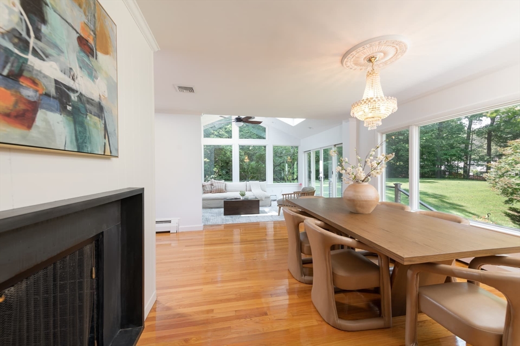 110 Robin Road Weston, MA 02493 - Photo 9 of 40 a view of a kitchen with a sink and wooden floor