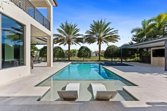 a view of outdoor space with swimming pool and porch