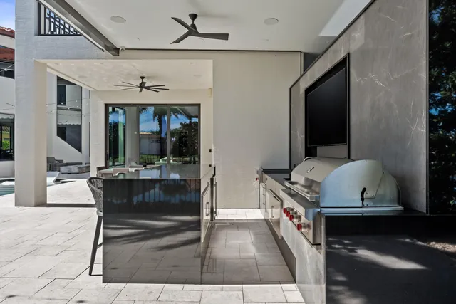 a view of living room with furniture and a flat screen tv