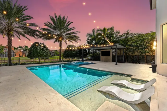 a view of a patio with swimming pool