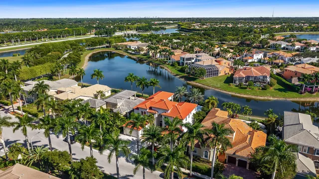 an aerial view of lake residential house with outdoor space