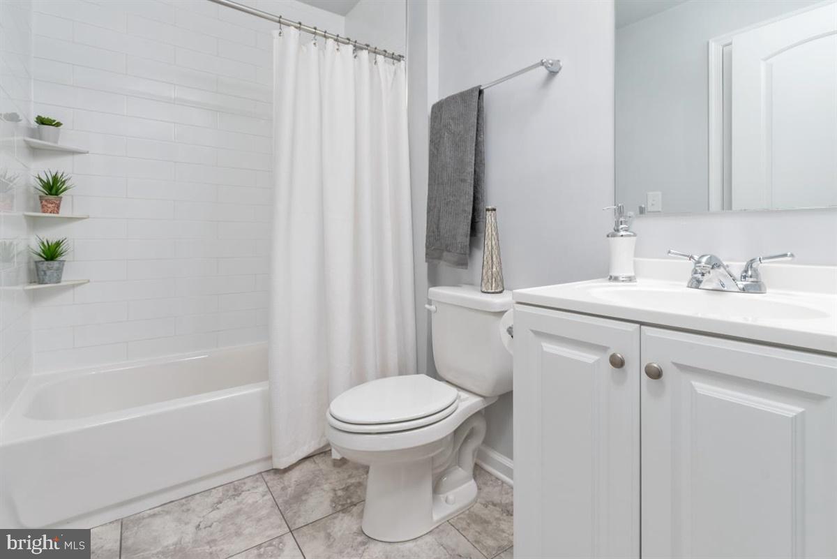 211 Brookfield Road Pasadena, MD 21122 - Photo 21 of 30 Bathroom with Subway Tile Shower