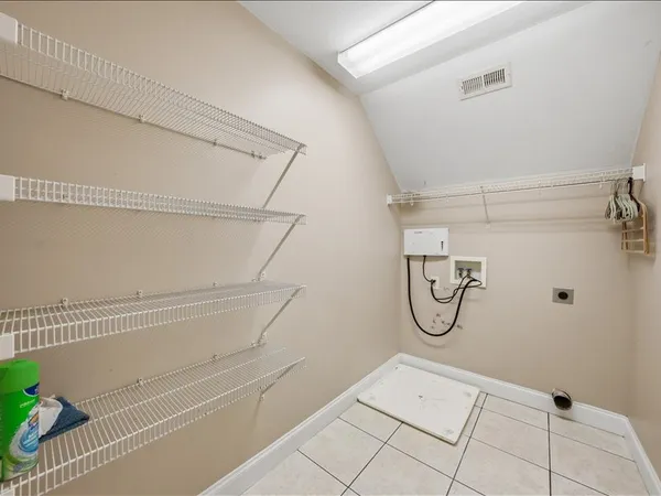 a view of a room with racks on the wall