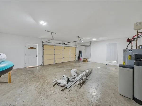 a room with furniture and a ceiling fan