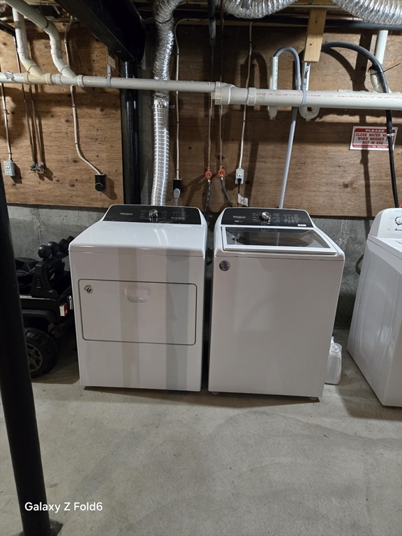 222 Buck Island Road, Unit 45 Yarmouth, MA 02673 - Photo 22 of 26 a utility room with dryer and washer