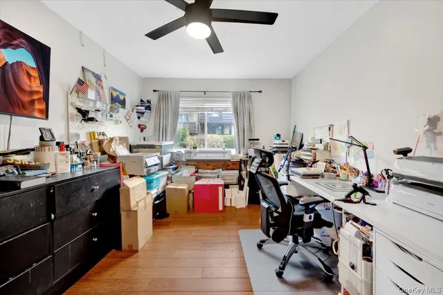 a view of a kitchen with dining table and chairs