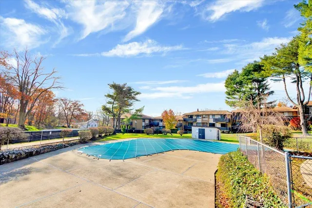 a view of a street with a houses