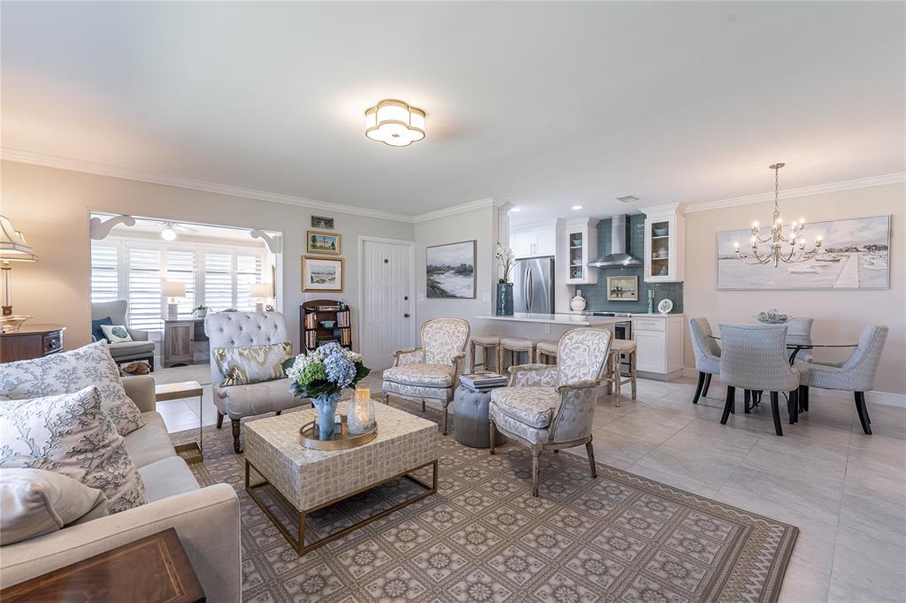 1130 Cir Terrace West, Unit D Delray Beach, FL 33445 - Photo 18 of 39 a living room with furniture and a dining table