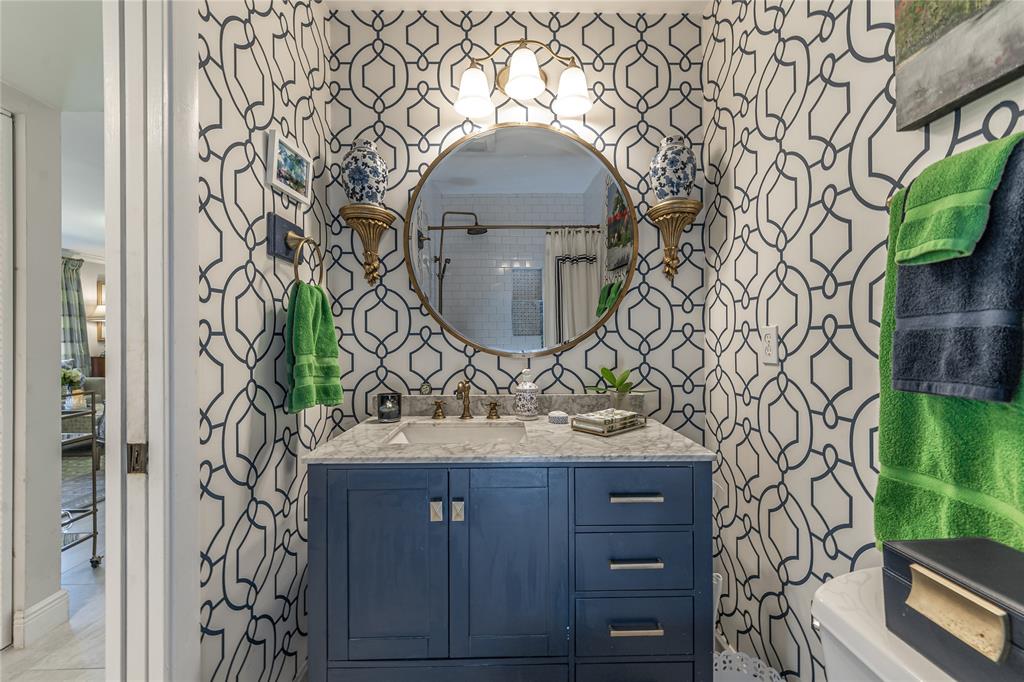 1130 Cir Terrace West, Unit D Delray Beach, FL 33445 - Photo 3 of 39 a bathroom with a sink and mirror with vanity