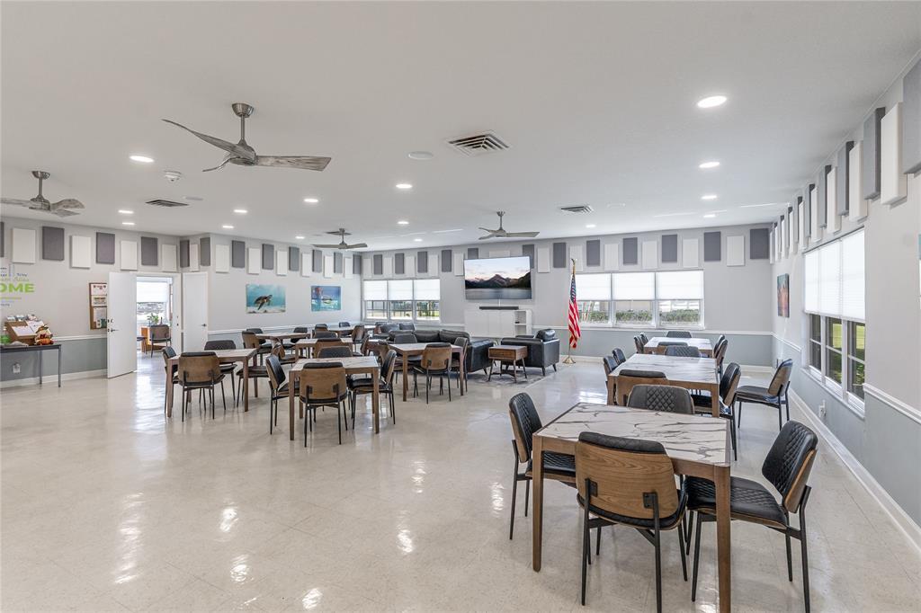 1130 Cir Terrace West, Unit D Delray Beach, FL 33445 - Photo 35 of 39 a view of a dining area with furniture