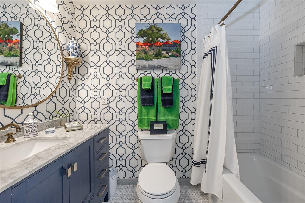 1130 Cir Terrace West, Unit D Delray Beach, FL 33445 - Photo 4 of 39 a bathroom with a sink mirror vanity and toilet
