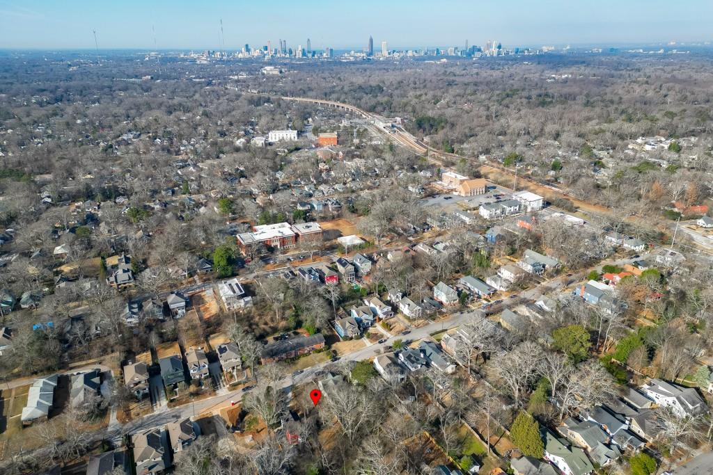 184 Olympic Place Decatur, GA 30030 - Photo 8 of 8 an aerial view of house with yard and mountain view in back