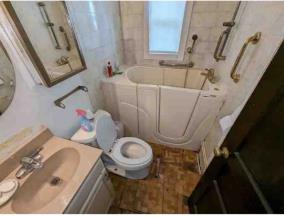 2835 Thomas Street Columbus, GA 31906 - Photo 12 of 19 a bathroom with a sink and toilet