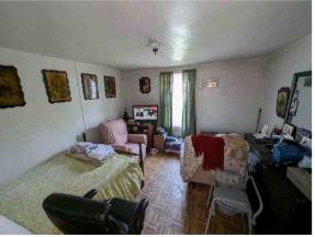 2835 Thomas Street Columbus, GA 31906 - Photo 13 of 19 a bedroom with furniture and a bed