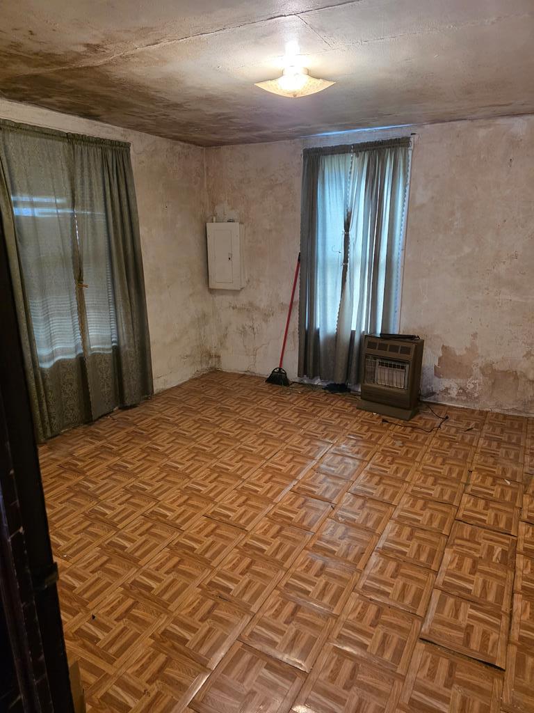 2835 Thomas Street Columbus, GA 31906 - Photo 15 of 19 a view of a hallway with brick walls and a window