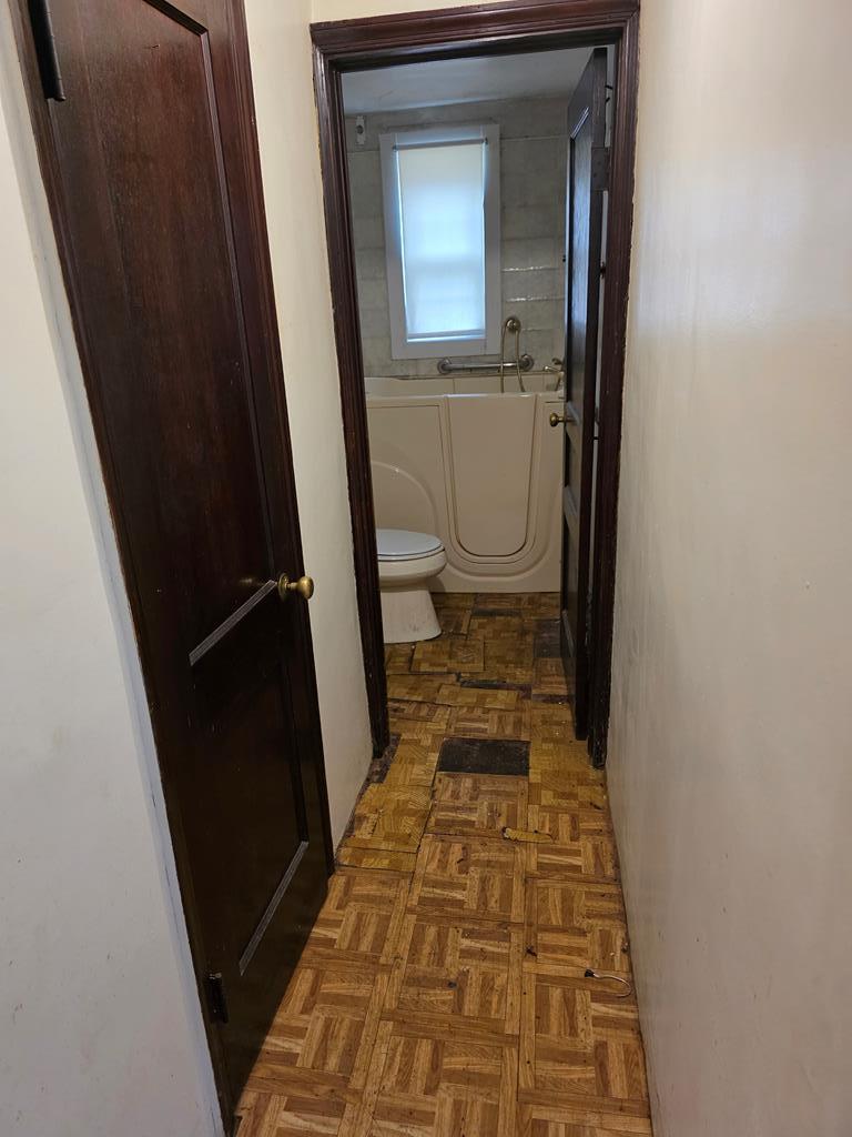 2835 Thomas Street Columbus, GA 31906 - Photo 16 of 19 a bathroom with a toilet and a shower