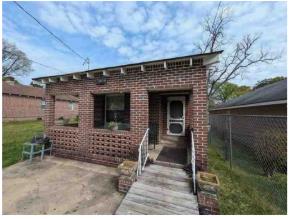 2835 Thomas Street Columbus, GA 31906 - Photo 10 of 19 a front view of a house with a large tree