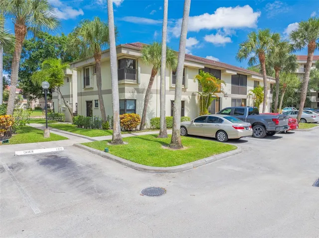 a view of a swimming pool with a lake view