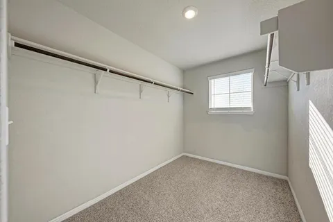 a view of bathroom with dual sinks