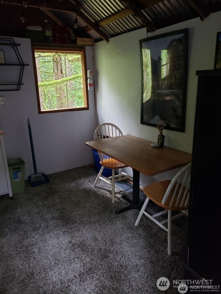 64308 Cascade River Road, Unit 1147 Marblemount, WA 98267 - Photo 7 of 8 a room with furniture and a window