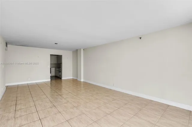 an empty room with an entryway