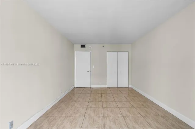 a view of room with hardwood floor